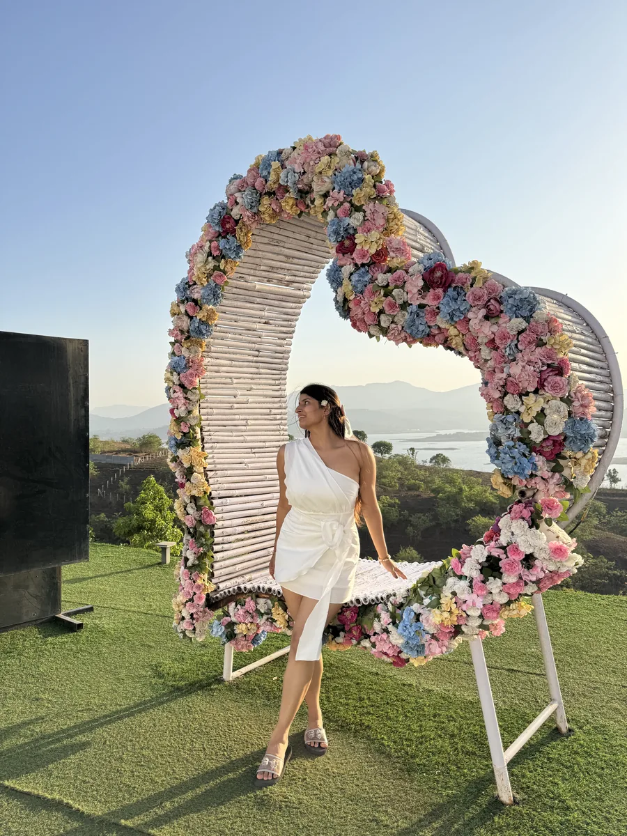 Floral heart frame decoration for a romantic proposal setup in Pawna