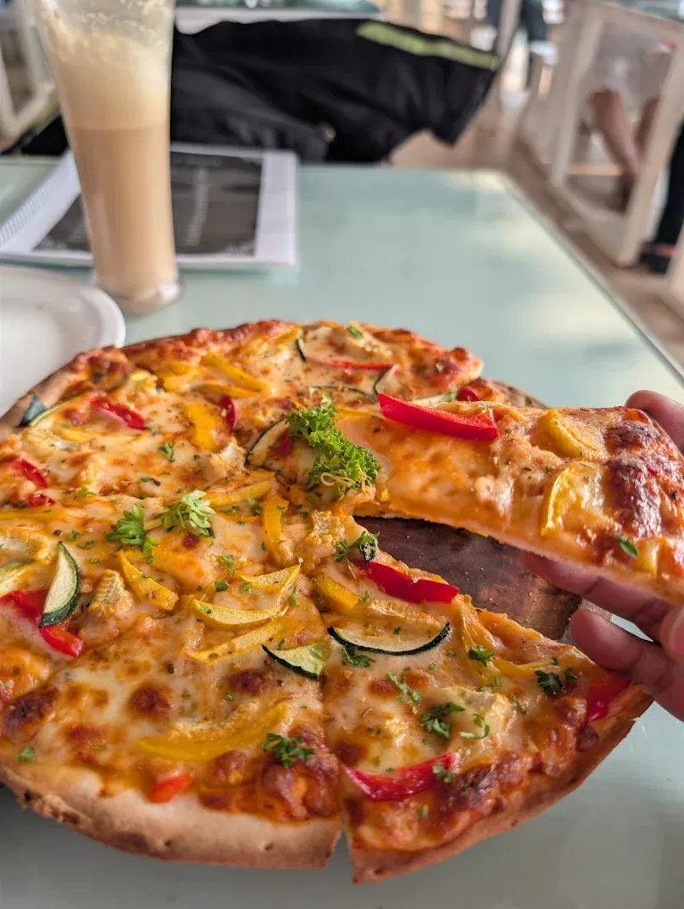 Loaded veg pizza at the lakeside restaurant near Pawna Lake
